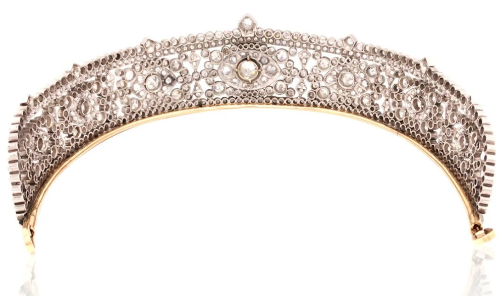 Platinum Diamond Tiara Metal: Platinum & 18K Gold
Diamonds: Three main stones approximately 1.45ct, 0.35ct, and 0.34ct; total diamond weight approximately 23.14ct