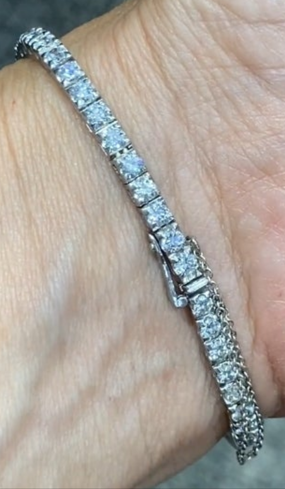 Elegent 1950s platinum and diamond 5 carat diamond watch wow