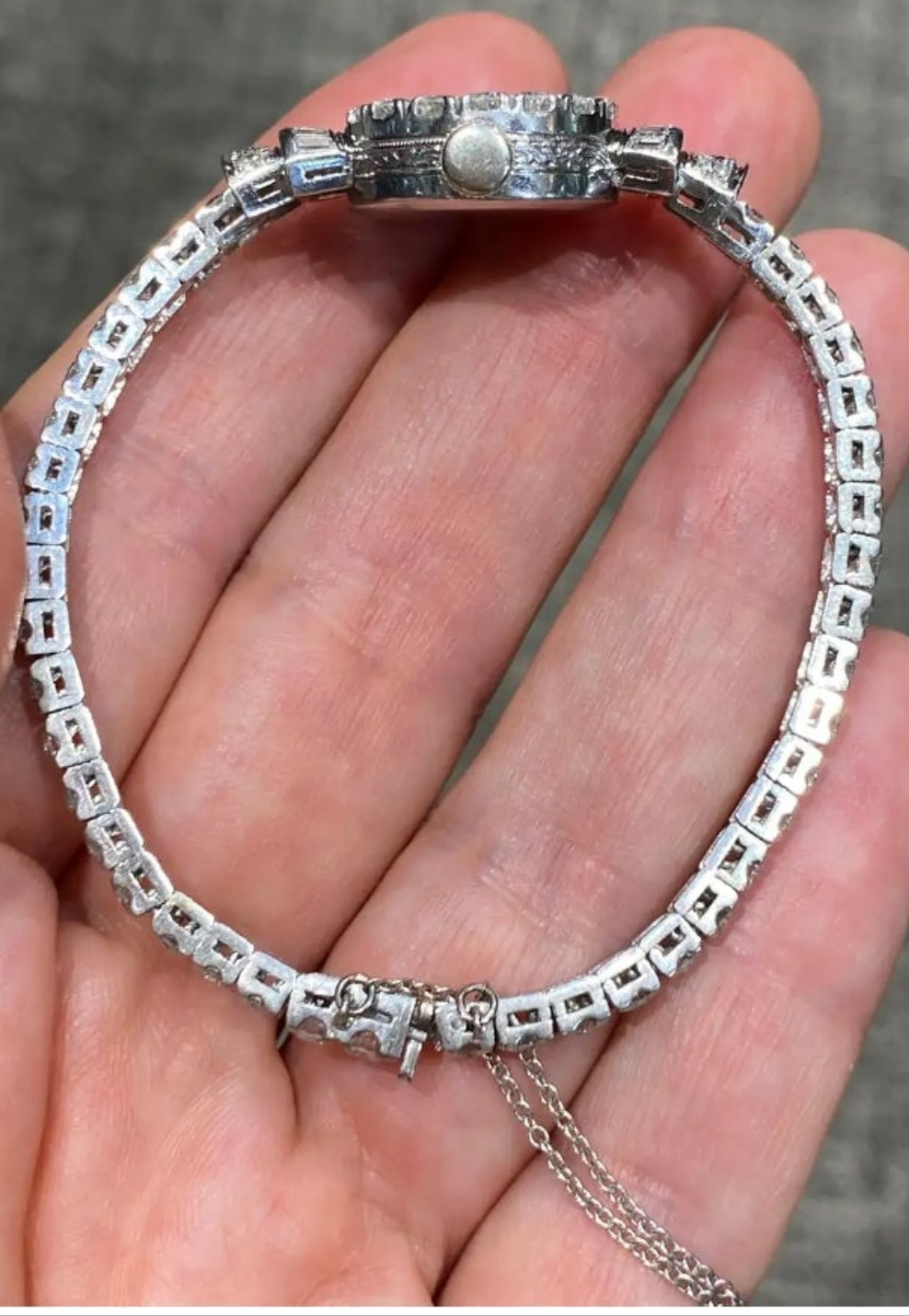 Elegent 1950s platinum and diamond 5 carat diamond watch wow
