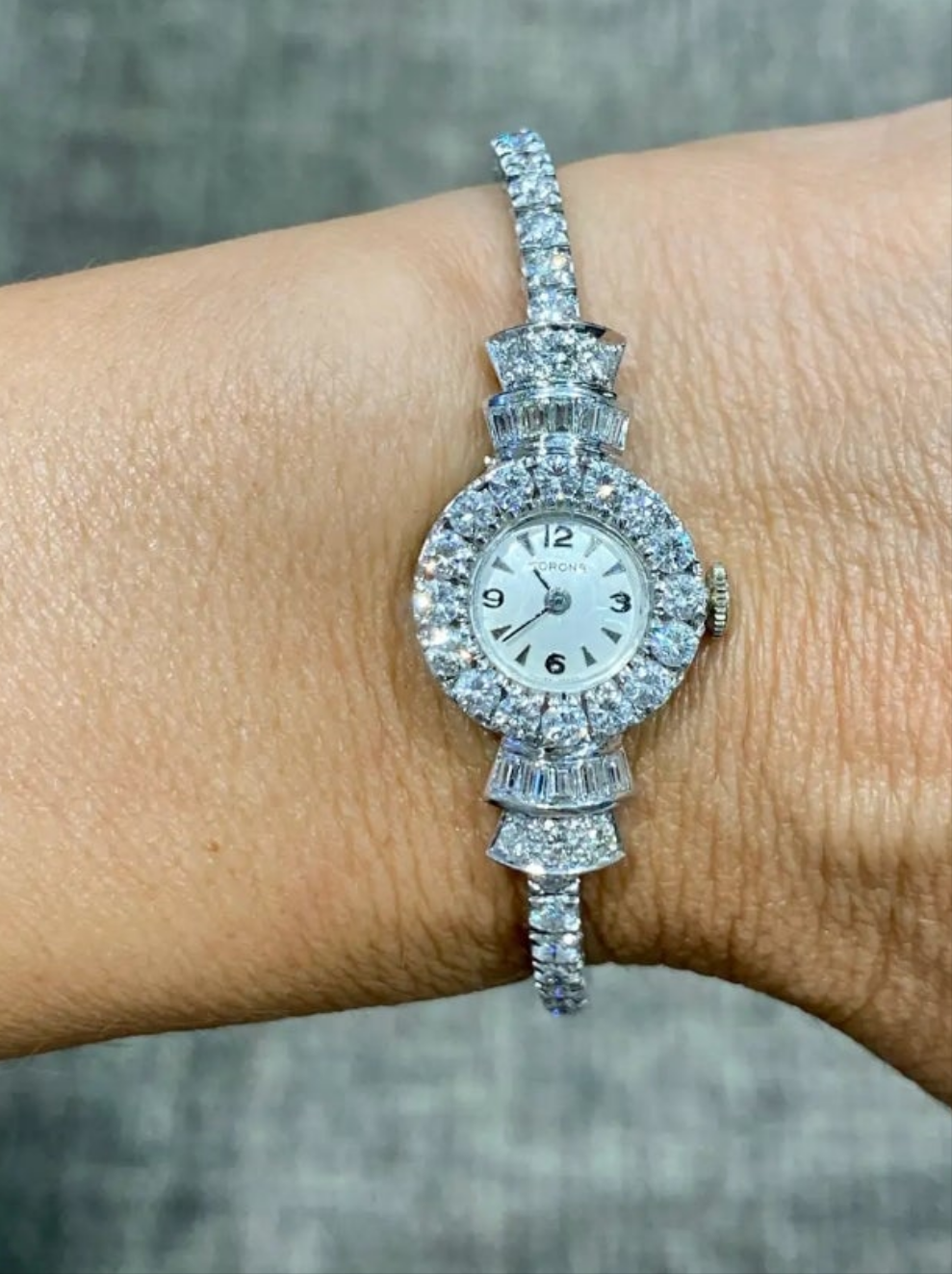 Elegent 1950s platinum and diamond 5 carat diamond watch wow