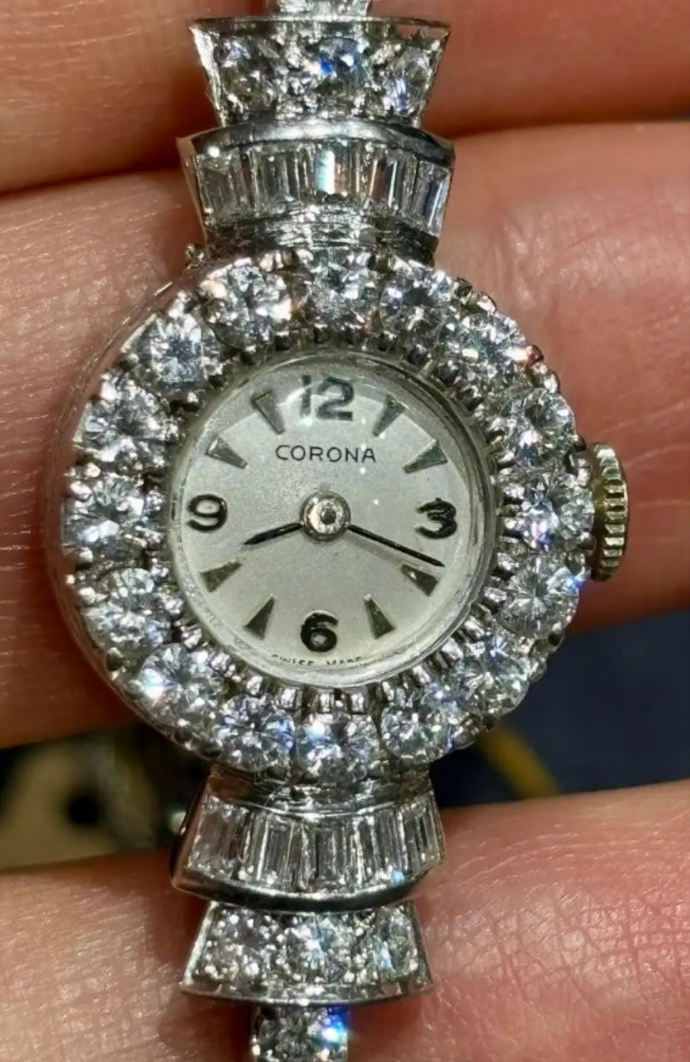 Elegent 1950s platinum and diamond 5 carat diamond watch wow