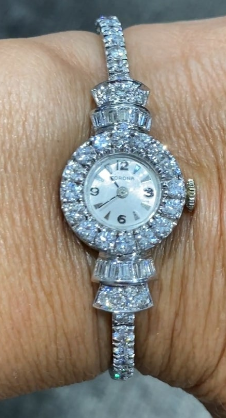 Elegent 1950s platinum and diamond 5 carat diamond watch wow