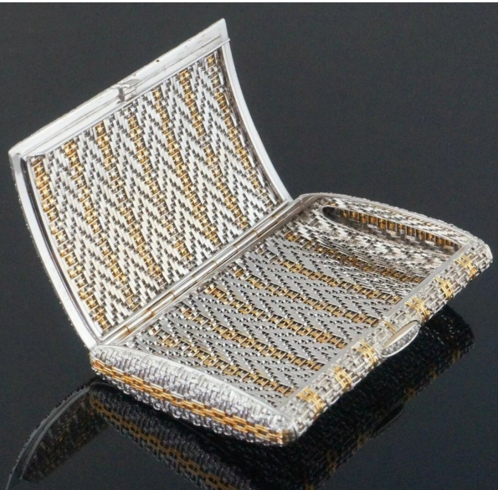 18k Gold .15 carat with a clarity grading of SI-1 and G/H in color. Rare Retro Two Tone Solid 18K Gold Weave & Link, & Diamond Accented Estate Cigarette Case