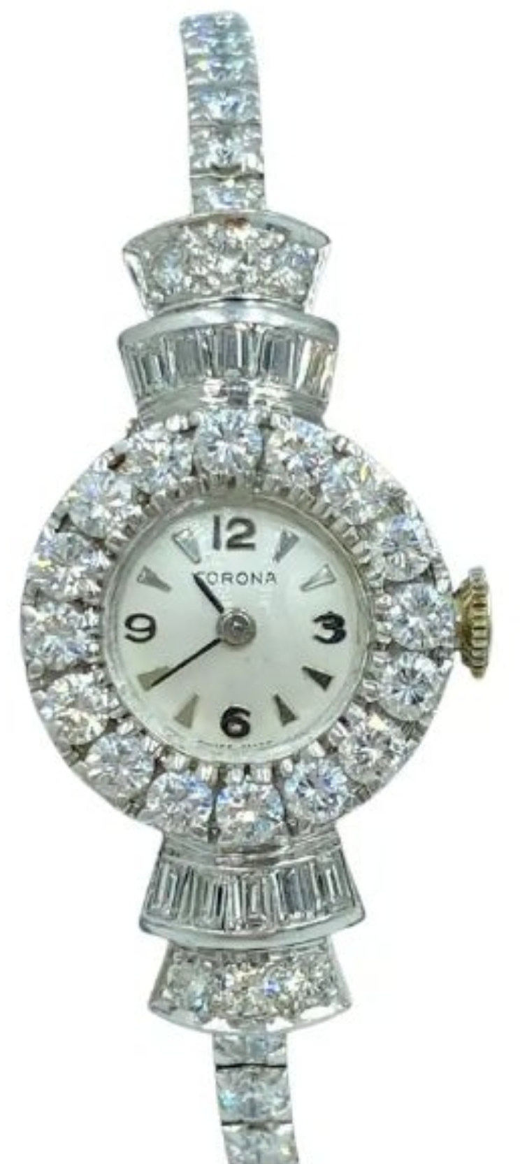 Elegent 1950s platinum and diamond 5 carat diamond watch wow