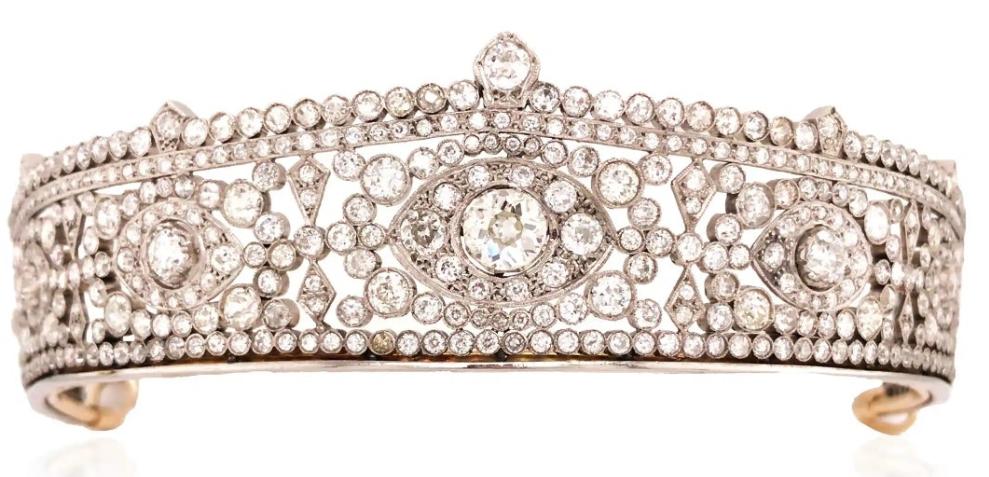 Platinum Diamond Tiara Metal: Platinum & 18K Gold
Diamonds: Three main stones approximately 1.45ct, 0.35ct, and 0.34ct; total diamond weight approximately 23.14ct