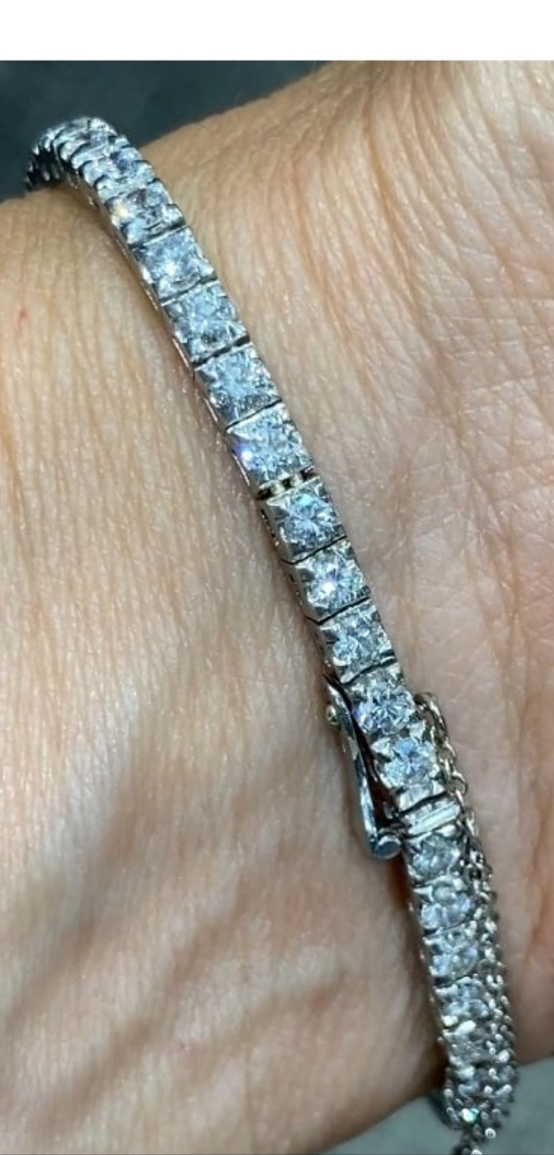 Elegent 1950s platinum and diamond 5 carat diamond watch wow