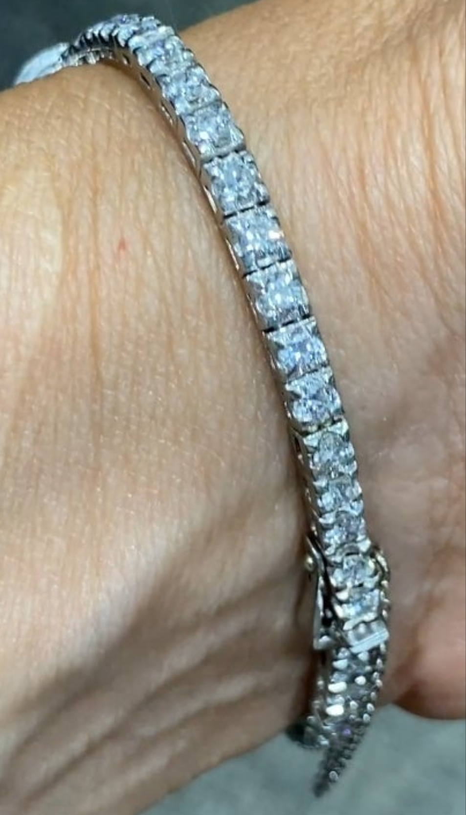 Elegent 1950s platinum and diamond 5 carat diamond watch wow