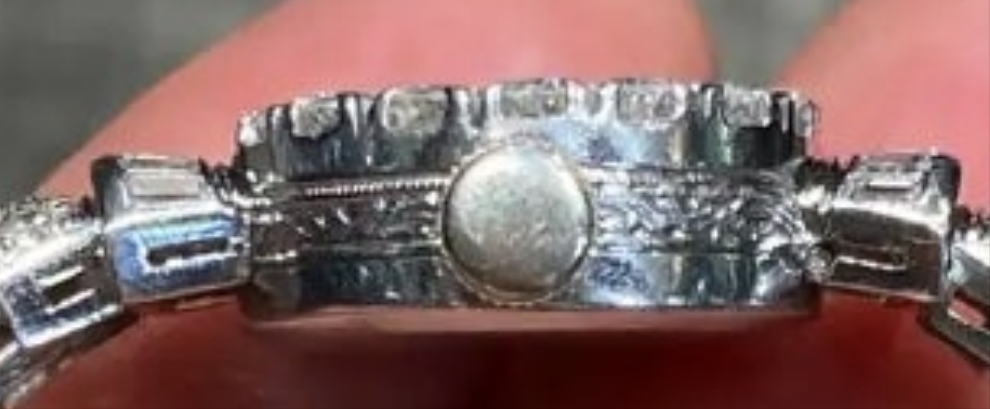 Elegent 1950s platinum and diamond 5 carat diamond watch wow
