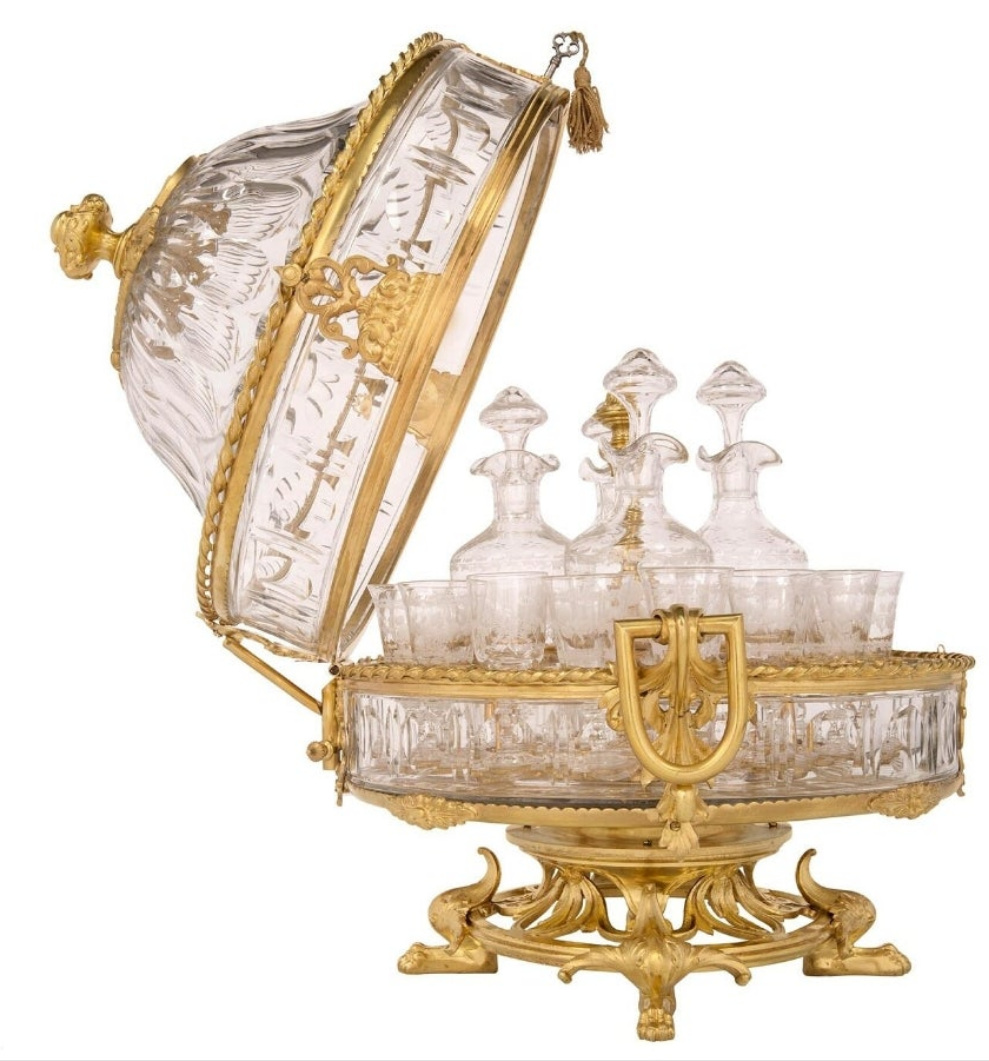 A French 19th century Belle Époque period Baccarat crystal Cave à Liqueur with glasses and decanters