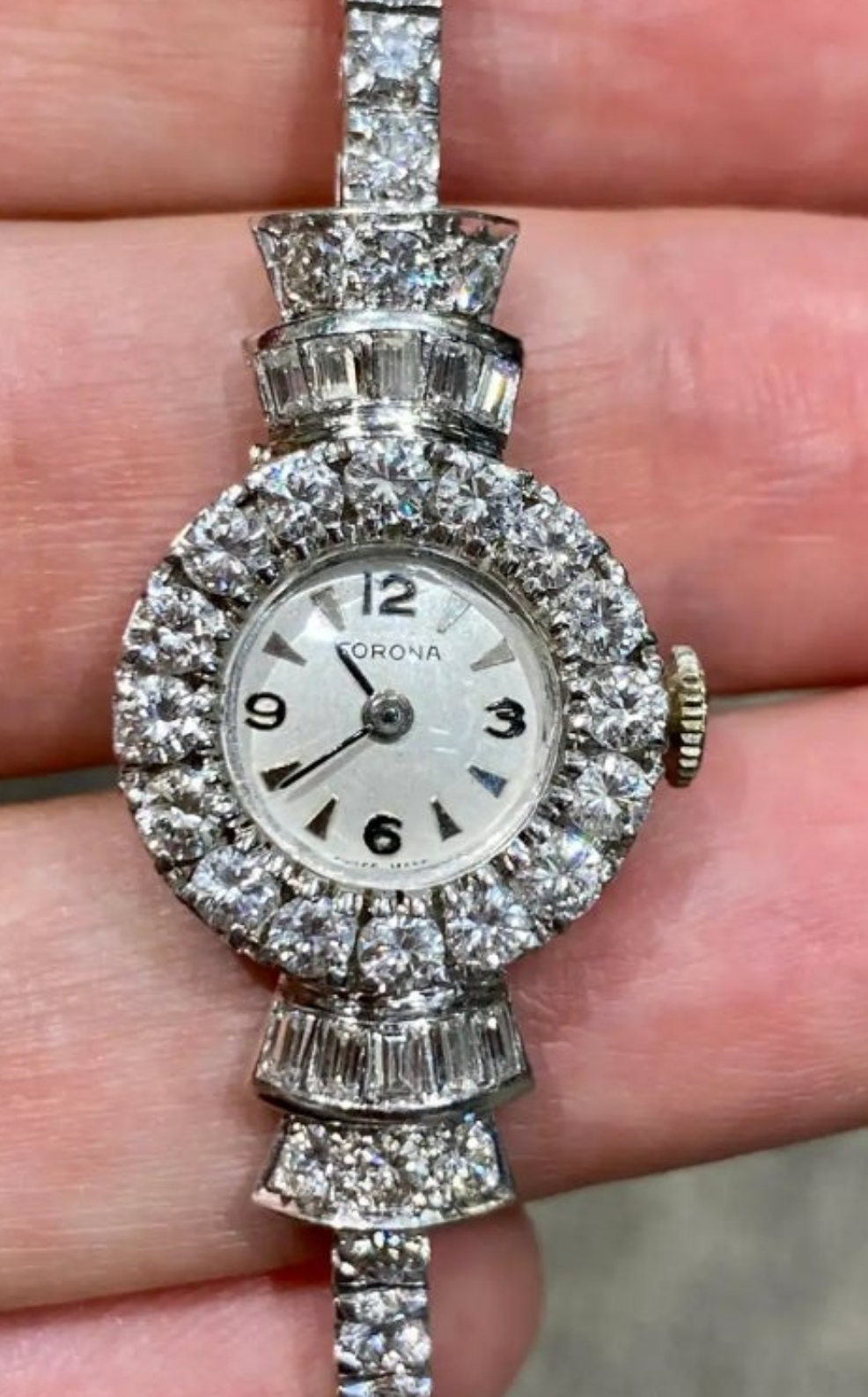 Elegent 1950s platinum and diamond 5 carat diamond watch wow
