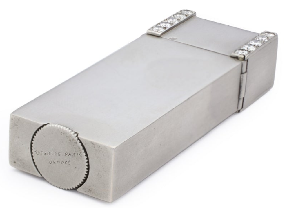 Ostertag Platinum and Diamond Lighter 28 circular and 5 baguette cuts with approximate total weight of 1.50 carats of diamonds circa 1930s