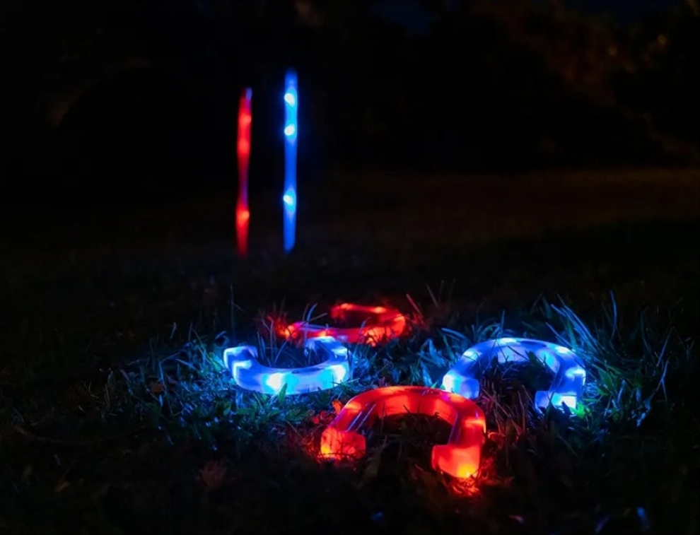 After Dark Illuminated Horseshoes - Complete with 2 Weighted Blue LED Horseshoes, 2 Weighted Red LED Horseshoes and 2 LED Stakes. Perfect for Play Both Day or Night.