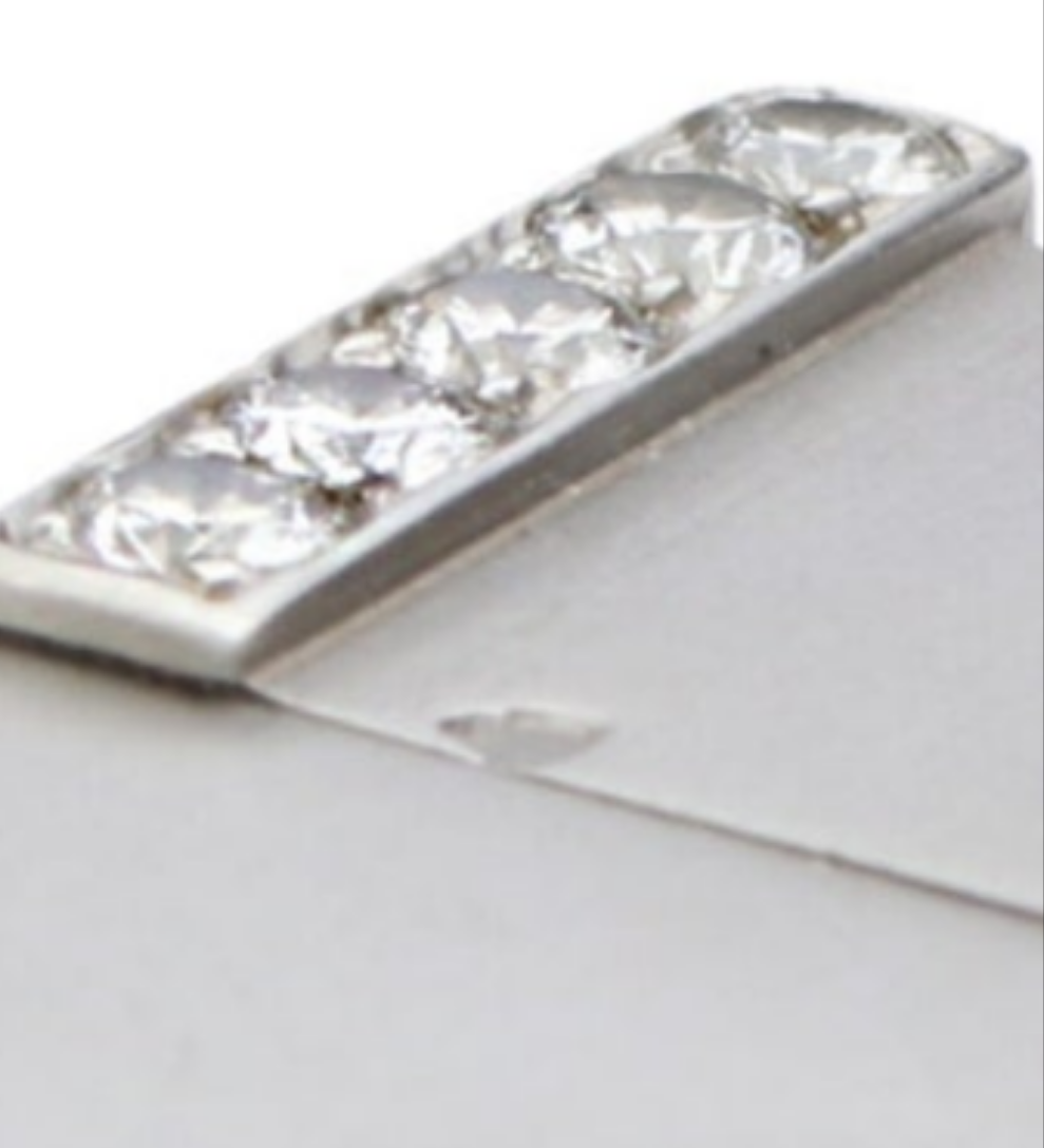 Ostertag Platinum and Diamond Lighter 28 circular and 5 baguette cuts with approximate total weight of 1.50 carats of diamonds circa 1930s