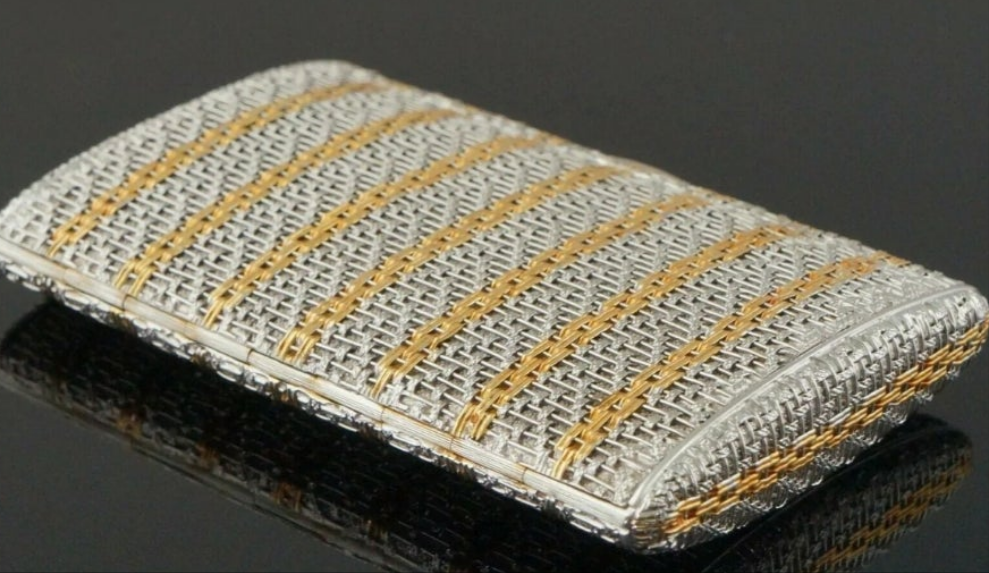 18k Gold .15 carat with a clarity grading of SI-1 and G/H in color. Rare Retro Two Tone Solid 18K Gold Weave & Link, & Diamond Accented Estate Cigarette Case
