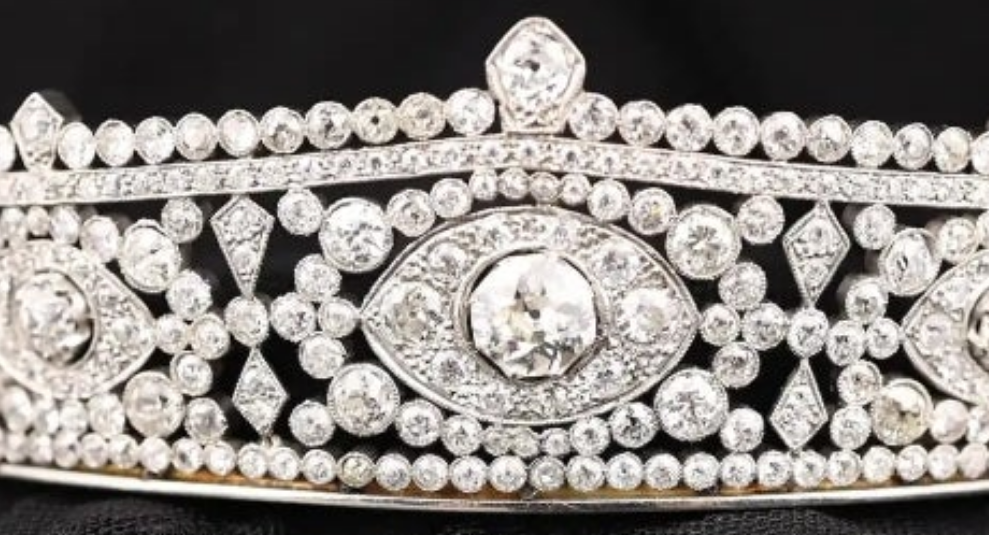 Platinum Diamond Tiara Metal: Platinum & 18K Gold
Diamonds: Three main stones approximately 1.45ct, 0.35ct, and 0.34ct; total diamond weight approximately 23.14ct