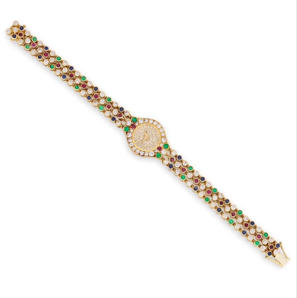 Chopard Diamond, Emerald, Ruby and Sapphire Watch 20 sapphires totaling 1.50 carats, 20 emeralds totaling 2.00 carats and 20 rubies totaling 1.50 carats
