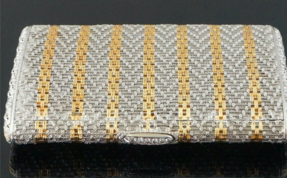 18k Gold .15 carat with a clarity grading of SI-1 and G/H in color. Rare Retro Two Tone Solid 18K Gold Weave & Link, & Diamond Accented Estate Cigarette Case