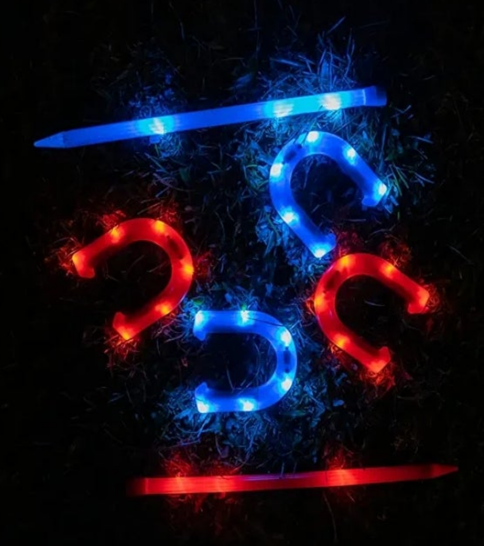 After Dark Illuminated Horseshoes - Complete with 2 Weighted Blue LED Horseshoes, 2 Weighted Red LED Horseshoes and 2 LED Stakes. Perfect for Play Both Day or Night.