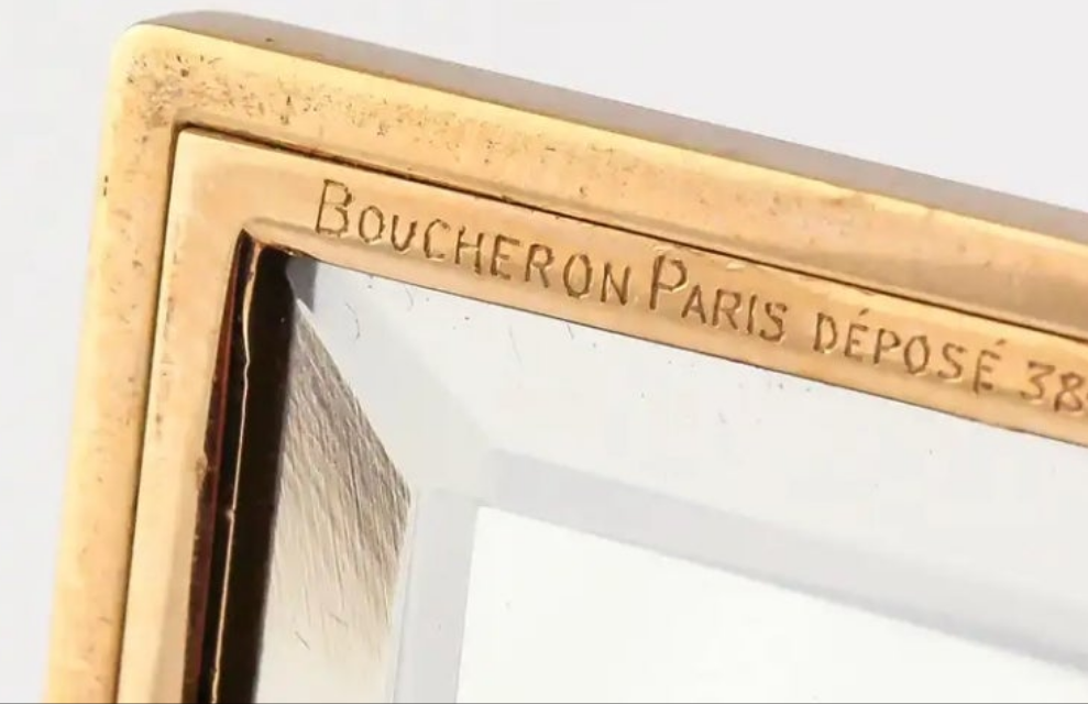 18k Gold Boucheron Paris Sapphire Diamond Compact Case high grade round brilliant cut diamonds and rich blue cabochon sapphires.