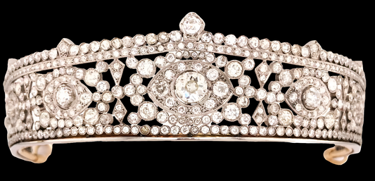 Platinum Diamond Tiara Metal: Platinum & 18K Gold
Diamonds: Three main stones approximately 1.45ct, 0.35ct, and 0.34ct; total diamond weight approximately 23.14ct