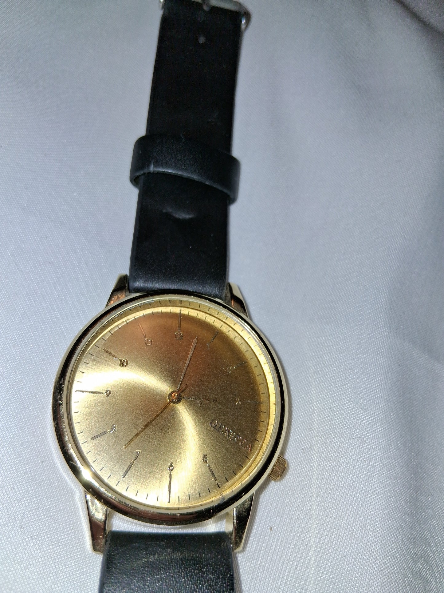 Mens Black and Gold watch