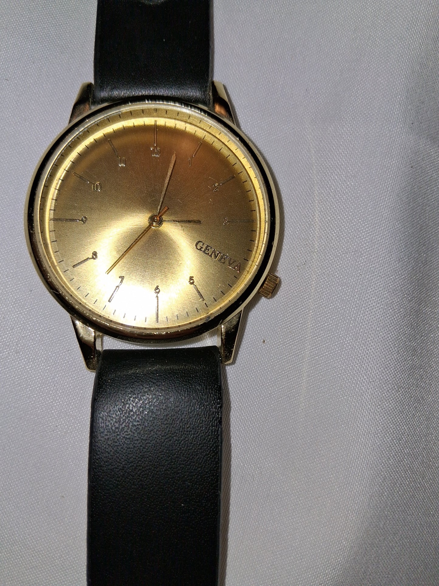 Mens Black and Gold watch