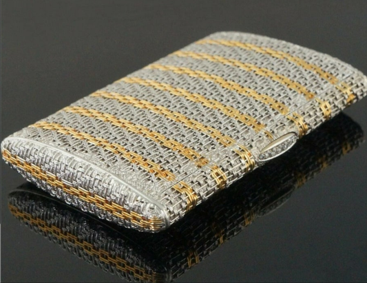 18k Gold .15 carat with a clarity grading of SI-1 and G/H in color. Rare Retro Two Tone Solid 18K Gold Weave & Link, & Diamond Accented Estate Cigarette Case