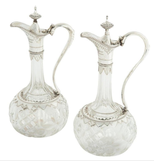Fabulous A pair of silver-mounted crystal Royal presentation claret jugs