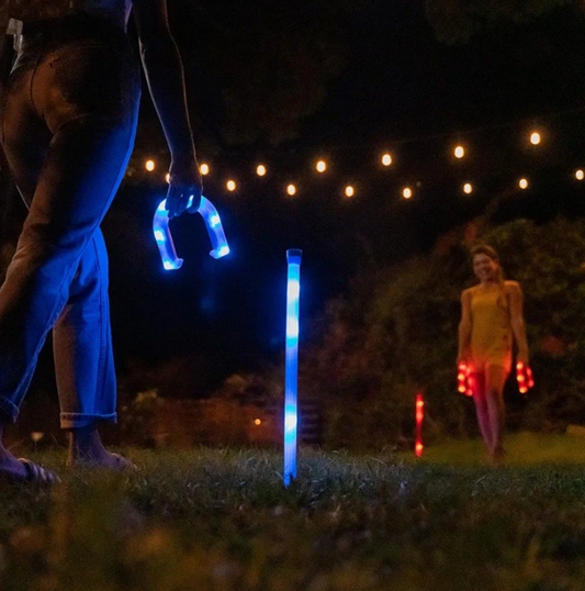 After Dark Illuminated Horseshoes - Complete with 2 Weighted Blue LED Horseshoes, 2 Weighted Red LED Horseshoes and 2 LED Stakes. Perfect for Play Both Day or Night.