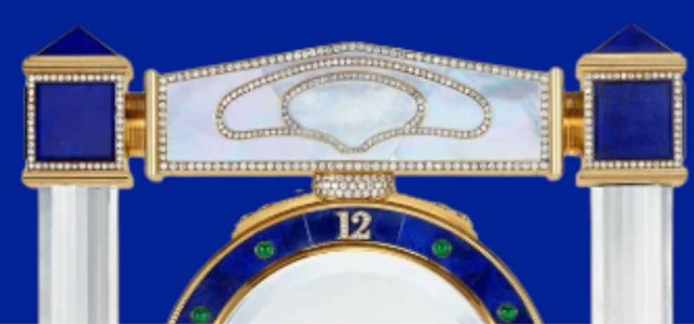 Diamond Mystery Clock Floating 2,150 grams of 18K yellow gold and it is adorned with an array of exceptional gemstones: two pear-shaped diamonds (3.02 and 1.79 carats), 49.96 carats of round-cut diamonds and 9.60 carats of cabochon emeralds.