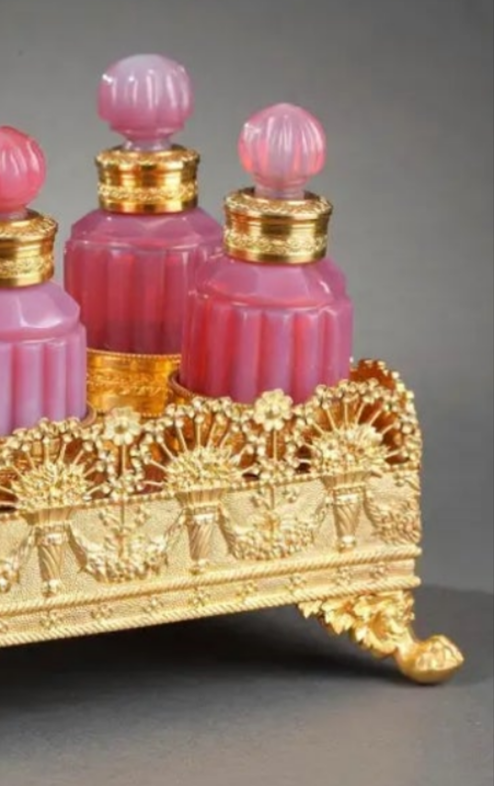 Gilt bronze perfume box with opaline "gorge de pigeon" flasks first 19th century crystal