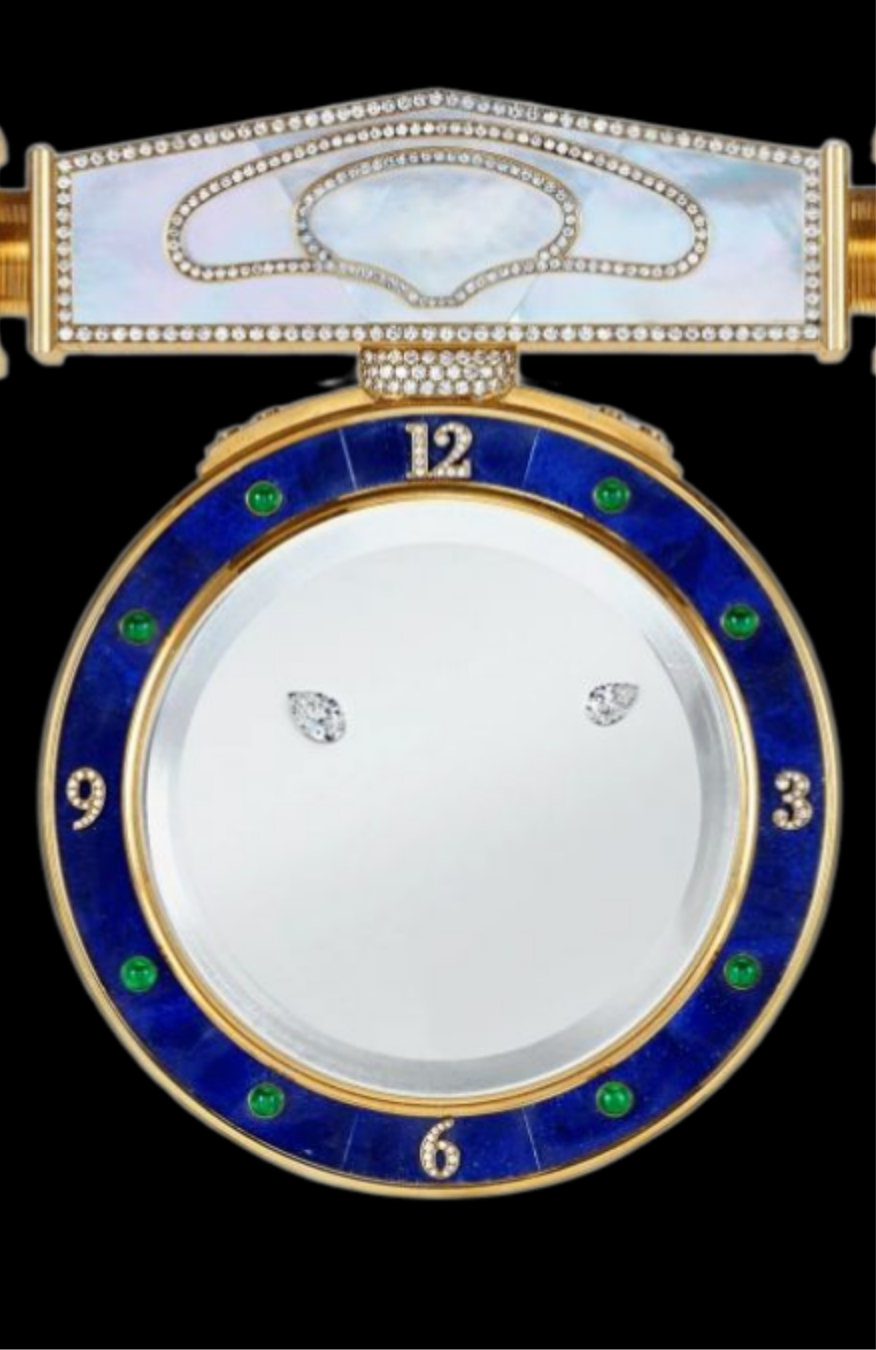Diamond Mystery Clock Floating 2,150 grams of 18K yellow gold and it is adorned with an array of exceptional gemstones: two pear-shaped diamonds (3.02 and 1.79 carats), 49.96 carats of round-cut diamonds and 9.60 carats of cabochon emeralds.