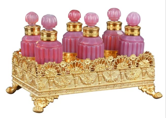 Gilt bronze perfume box with opaline "gorge de pigeon" flasks first 19th century crystal