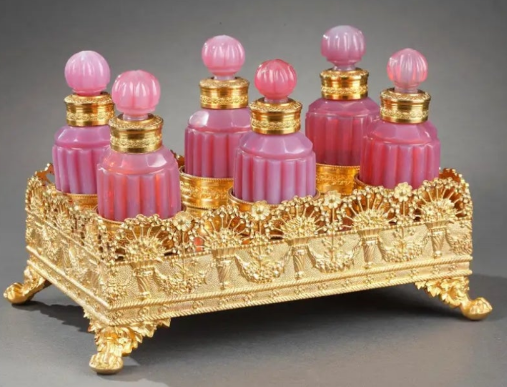 Gilt bronze perfume box with opaline "gorge de pigeon" flasks first 19th century crystal
