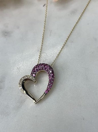 COCOMONEY  1/7 Carat Diamond and 1 Carat Red Ruby Asymmetrical Open Heart Pendant Necklace for Women in 14k Yellow Gold (White, cttw) on 18 Inch Long Chain with Lobster Claw Clasp