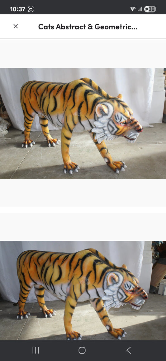 Life-size Fiberglass Tiger Statue. Handcrafted and casted, this stunning piece embodies power and grace. Add a touch of the wild to your space with this majestic sculpture. Size: 92"L x 20"W x 40"H. Weight is: 90L